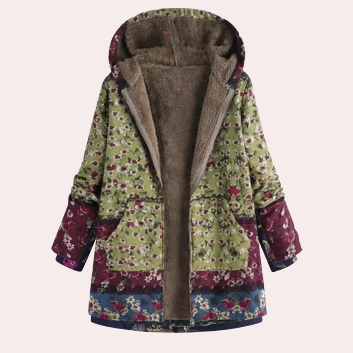 Grün lange Jacke mit Kapuze und wollener Innenausstattung kombiniert trendigen Blumenprint